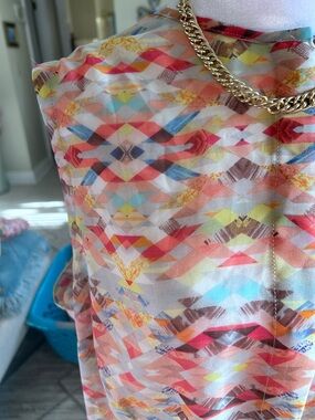 CAbi elite top. NWT, colorful, dress up or down. Great for summer or layering.